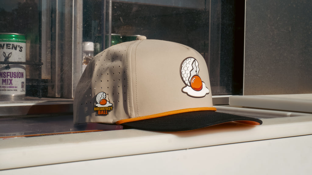 Breakfast Ball Golf Hat | Snapback Cap | Built-in Magnetic Ball Marker Holder + Marker Included | Breakfast Ball | Adjustable | Mulligan Tan